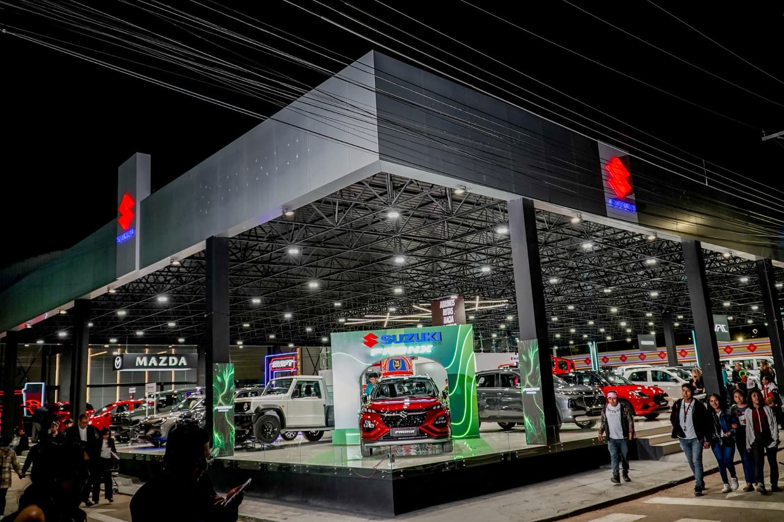 Suzuki celebra 15 años en la cima del mercado boliviano y lo festeja en la Fexco con sabor cochabambino